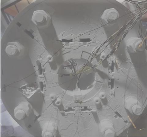 Single aperture superconducting quadrupole magnet mock-up after testing at 77 K